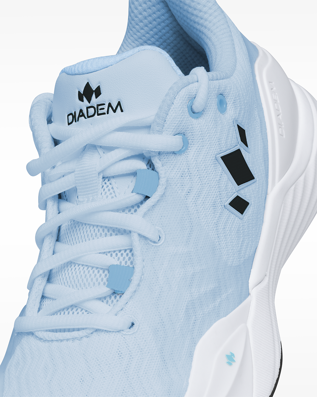 Diadem Court Burst pickleball shoe in Arctic Mist, close-up of the laces and upper